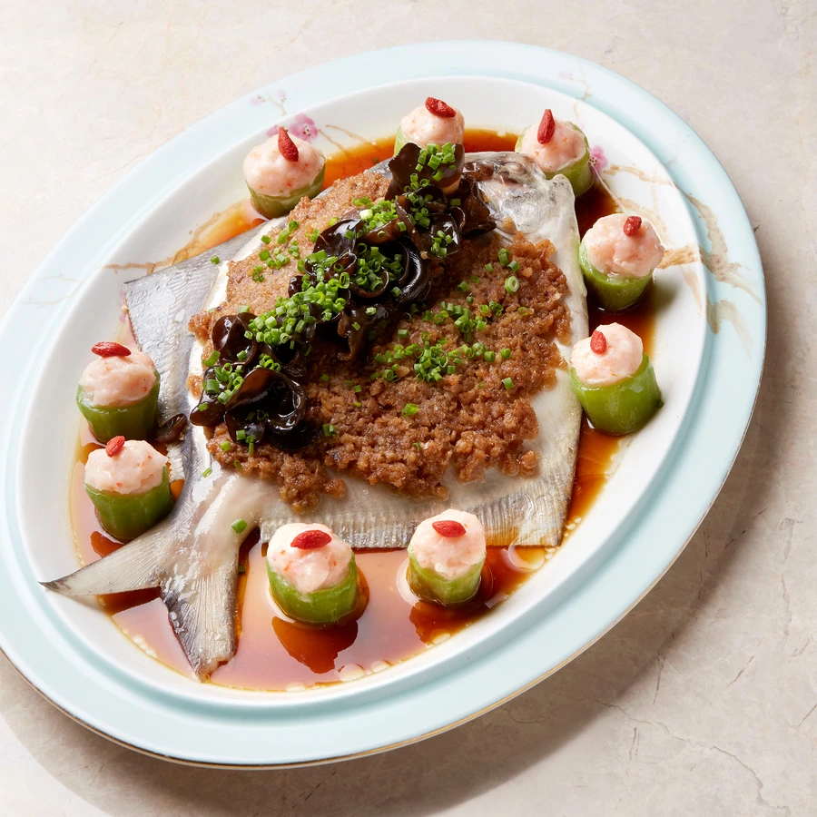 Steamed Pomfret with Sun-dried Turnips & Dried Shrimp Sauce served with Luffa Melon stuffed with Minced Shrimp & Black Fungus